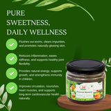 Jar of honey with health benefits text on a green background