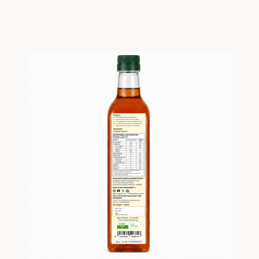 Bottle of syrup with a label on a white background