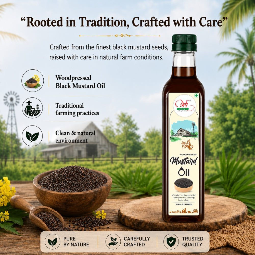 Bottle of black mustard oil with a rustic background featuring seeds and a windmill.