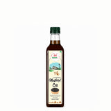 Bottle of mustard oil with a green cap on a white background