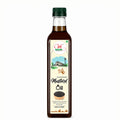 Bottle of mustard oil with a label on a white background