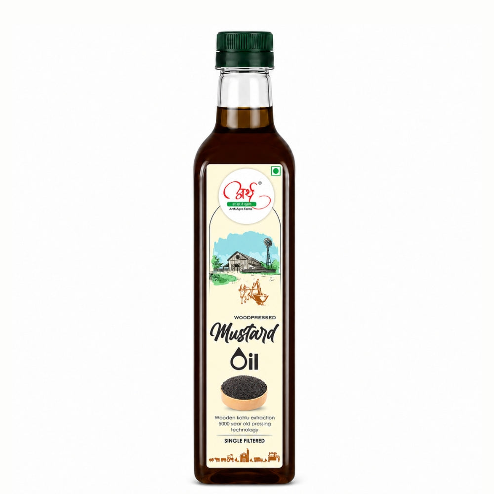 Bottle of mustard oil with a label on a white background