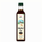 Bottle of mustard oil with a label on a white background