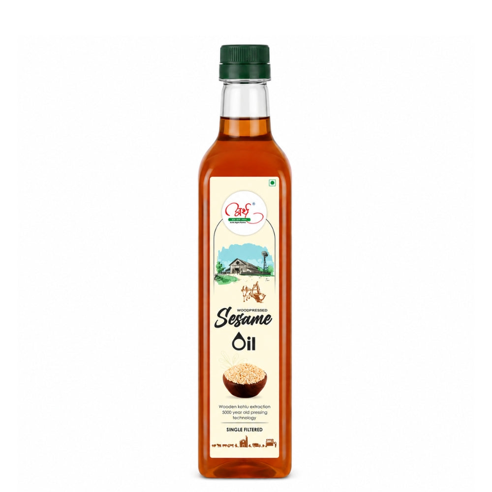 Bottle of sesame oil with a label on a white background