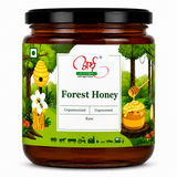 Jar of Forest Honey with a green label featuring honey-related illustrations on a white background.