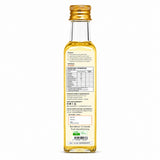 Bottle of oil with a gold cap on a white background