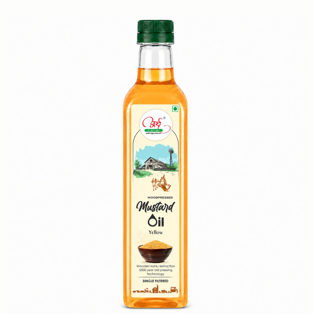 Bottle of mustard oil with a green cap on a white background