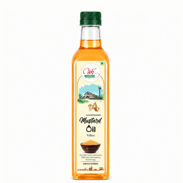 Bottle of mustard oil with a green cap on a white background