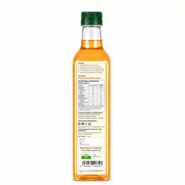 Bottle of olive oil with a green cap on a white background