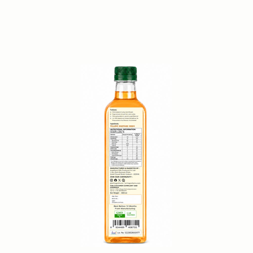 Bottle of olive oil with a green cap on a white background